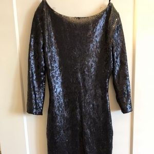 Sequinned cocktail dress with mid length sleeves